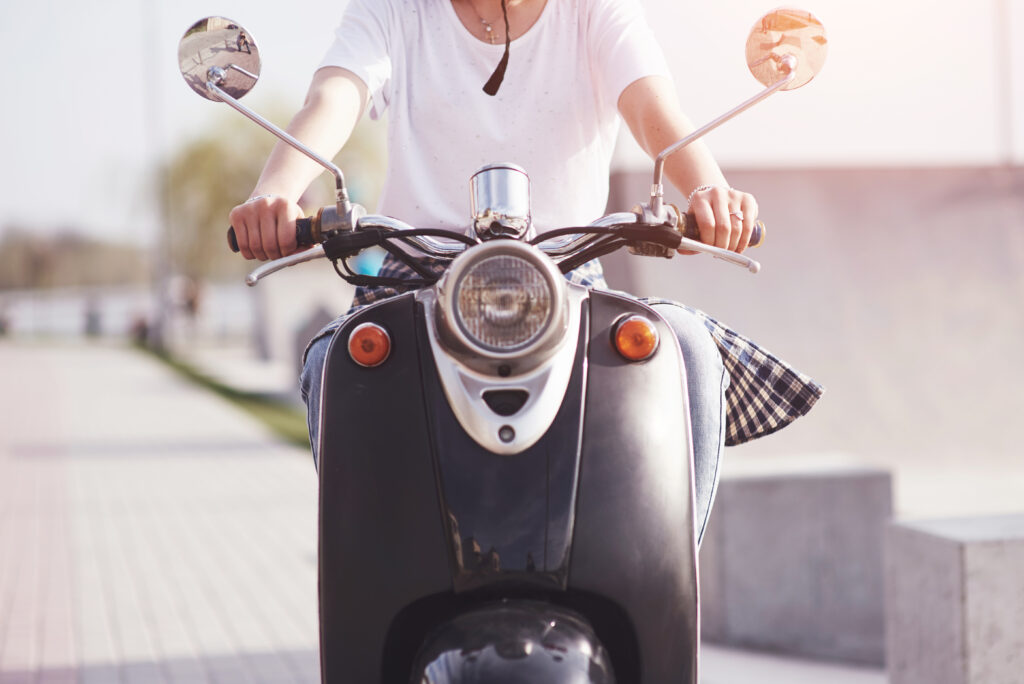 girl hipster sitting on a black retro scooter smi 2023 11 27 05 30 04 utc